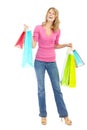 Spotting something she really likes. Full length of a pretty young woman holding shopping bags while isolated on white. Royalty Free Stock Photo