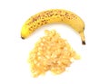 Spotty ripe whole banana with mashed fruit