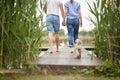 Spouses enjoy an after rain weather on the dock Royalty Free Stock Photo