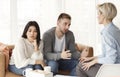 Spouses Talking With Counselor Discussing Family Problems Sitting In Office Royalty Free Stock Photo