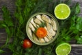 Sprats in a can, fresh healthy gastronomy gourmet nutritious delicious dill lime lunch on wooden background