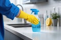 spray bottle spraying blue cleaning solution Royalty Free Stock Photo