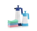 Spray bottles of cleaning products and rags Royalty Free Stock Photo