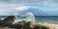 Spray broken reef on beach