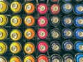 Spray cans of paint are on display. paint sprayers of various colors. graffiti art, car painting. balloons filled with colorful Royalty Free Stock Photo