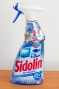 Spray for cleaning glass and windows of Sidolin. Blue container with German Sidolin applicator.