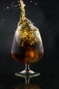 Spray in cognac glasss Royalty Free Stock Photo
