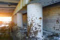 Spray dirt on poles under the bridge on an impassable road.