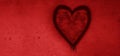 Spray graffiti red heart symbol. White wall on background. Fall in love and St. Valentines day. concept of 14th february. Happy Royalty Free Stock Photo