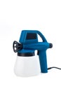 Spray gun for painting a hand-held electric tool. Blue industrial spray gun for painting isolated on white background. The tool Royalty Free Stock Photo