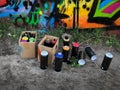 Spray paint cans for graffiti on floor Royalty Free Stock Photo