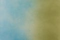 spray paint gradient from green to blue on a white paper background. Royalty Free Stock Photo