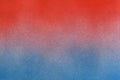 spray paint gradient from red to blue on a white paper background Royalty Free Stock Photo