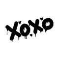 Spray painted graffiti Xoxo word in black over white. Drops of sprayed Xoxo words. isolated on white background.