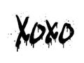 Spray painted graffiti Xoxo word in black over white. Drops of sprayed Xoxo words