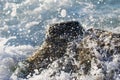 Spray of sea water on the rocks Royalty Free Stock Photo