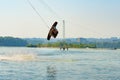 Wakeboarder is flying behind the cable Royalty Free Stock Photo