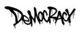 Sprayed democracy font graffiti with overspray in black over white. Vector illustration.