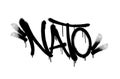 Sprayed NATO font with overspray in black over white. Vector illustration. Royalty Free Stock Photo