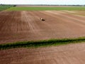 Tractor with sprayer machine working in fields, Zulawy Wislane