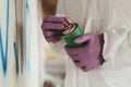 Spraying graffiti close up. Graffiti artist painting. Royalty Free Stock Photo