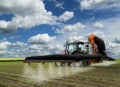Spraying soybean field at spring Royalty Free Stock Photo
