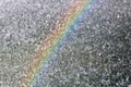 Spraying water with a rainbow