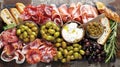 A spread of olives sliced meats and dips perfect for creating delicious combinations on a slice of crusty bread Royalty Free Stock Photo