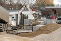 Poland Ostrowiec Swietokrzyski December 18, 2021 at 11:40. A small Bobcat excavator at a construction site.