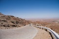 Vehicle ascending the steep Spreetshoogte Pass road in remote central Namibia Royalty Free Stock Photo