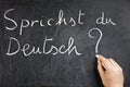 Sprichst du Deutsch Hand Writing Blackboard Royalty Free Stock Photo