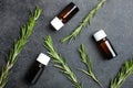 Sprig rosemary and bottle aroma oils