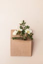 Sprigs of tea light rose in a paper bag Royalty Free Stock Photo