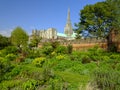 Spring afternoon sunshine on Chichester cathedral from Bishop`s Palace Gardens, Chichester, West Sussex, UK