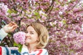 Spring allergy. Beautiful woman enjoying nature blooming tree. Royalty Free Stock Photo