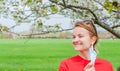 Spring allergy. Beautiful woman enjoying nature blooming tree Royalty Free Stock Photo