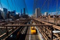 Spring April 2015 Brooklyn Bridge Traffic with yellow cab and pe Royalty Free Stock Photo