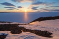 Spring arctic landscape with the midnight sun and the coast of the Arctic Ocean