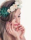 Attractive woman outdoors beauty portrait. Romantic girl with beautiful nails and flowers Royalty Free Stock Photo