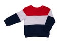 Spring and autumn children clothes. A red white blue striped cozy warm sweater or pullover isolated on a white background. Winter Royalty Free Stock Photo