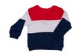 Spring and autumn children clothes. A red white blue striped cozy warm sweater or pullover isolated on a white background. Winter Royalty Free Stock Photo