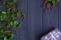 Spring background with birch branches on a gray wooden background with a place for inscription. Frame for spring text