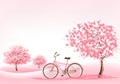 Spring background with a blossoming tree and a bike.