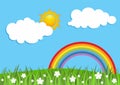 Spring Background with Rainbow. Rainbow with clouds, sun, grass and flowers with blue sky Royalty Free Stock Photo