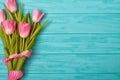 Spring background.Tulips on a wooden background.Holiday greeting card for Valentine`s Day, Woman`s Day, Mother`s Day, Easter! Royalty Free Stock Photo