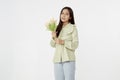 Spring Beautiful cheerful girl smiling and holding a bouquet of tulip flowers. Young happy woman. Surprise at the 8 March Royalty Free Stock Photo