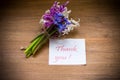 Spring beautiful flowers of a hyacinth with a thank you card Royalty Free Stock Photo