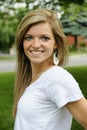 Spring beauty girl. Beautiful young woman in a summer park outdoor portrait Royalty Free Stock Photo