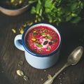 Spring beetroot soup with mint, pistachio, chia, flax, pumpkin seeds Royalty Free Stock Photo