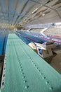 Spring board in indoor swimming pool Royalty Free Stock Photo